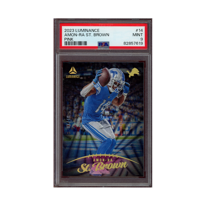 Amon-Ra St. Brown 2023 Panini Luminance Football Pink /10 PSA 9